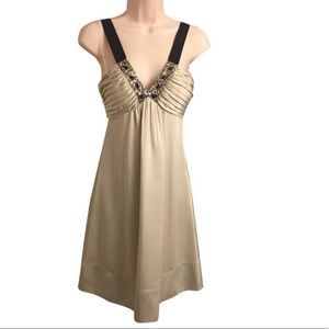 Perfect condition BCBG gold and beaded cocktail dress. Worn once. Size 2.